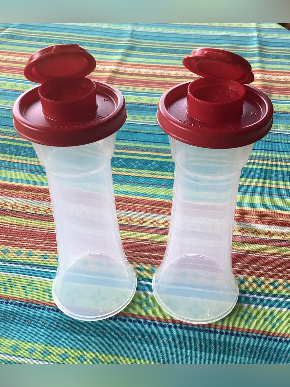 Tupperware Salt and Pepper Shakers - one set in Red